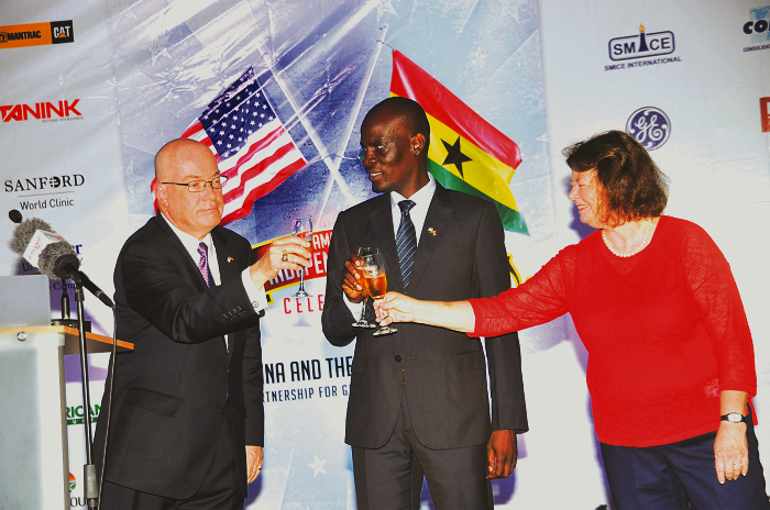 Mr Haruna Iddrisu (middle) responding to a toast to Mr Robert Jackson. With them is Mrs Barbara Jackson US Embassy commemorates America Independence Day